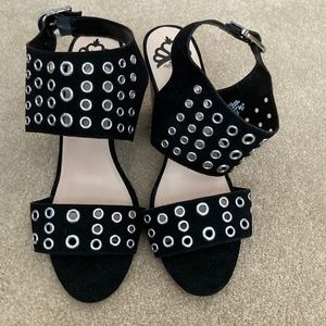 Fergalicious women's size 9 1/2 grommeted sandals.